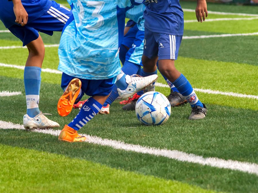 Children playing a football match